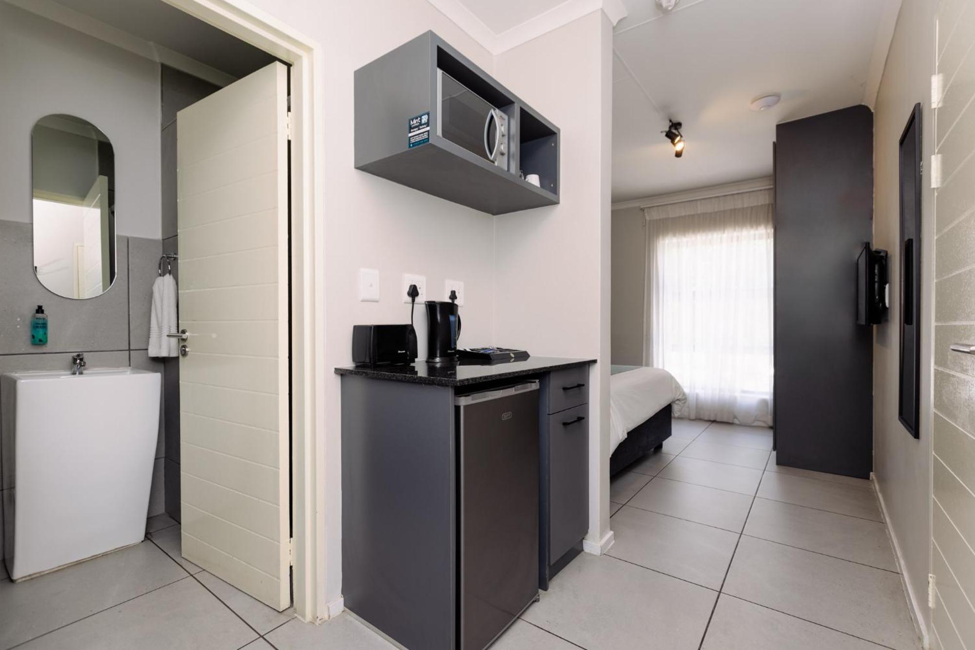 Апартаменты Mint Express Melrose View Йоханнесбург Номер фото